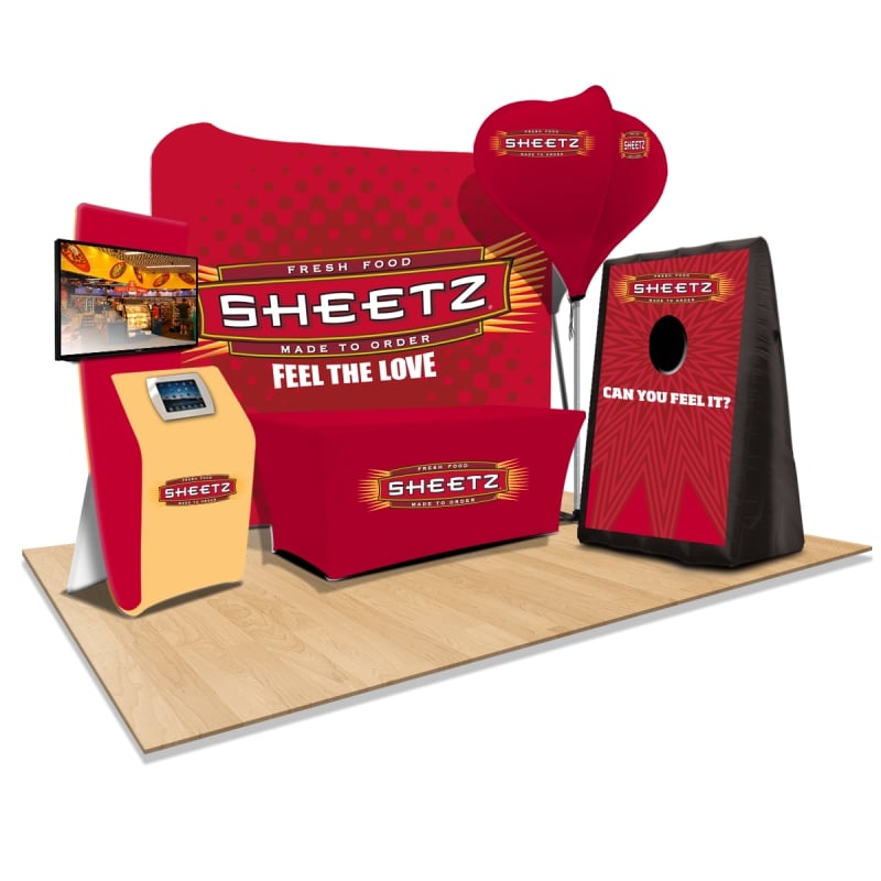 Indoor Event Booth with Monitor Stands and Inflatable Carnival Game